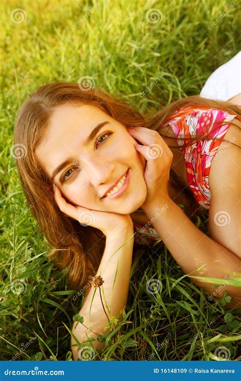 young girl braless|Braless Busty young girl lays down on meadow cleavage.
